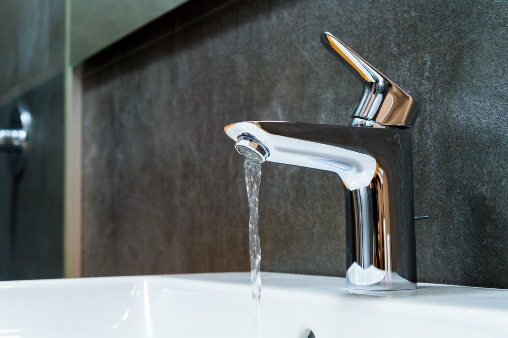 Open chrome faucet washbasin