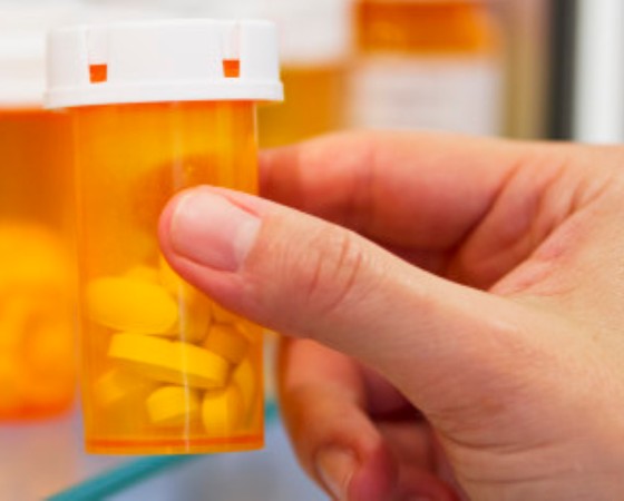 Pill bottles on shelf